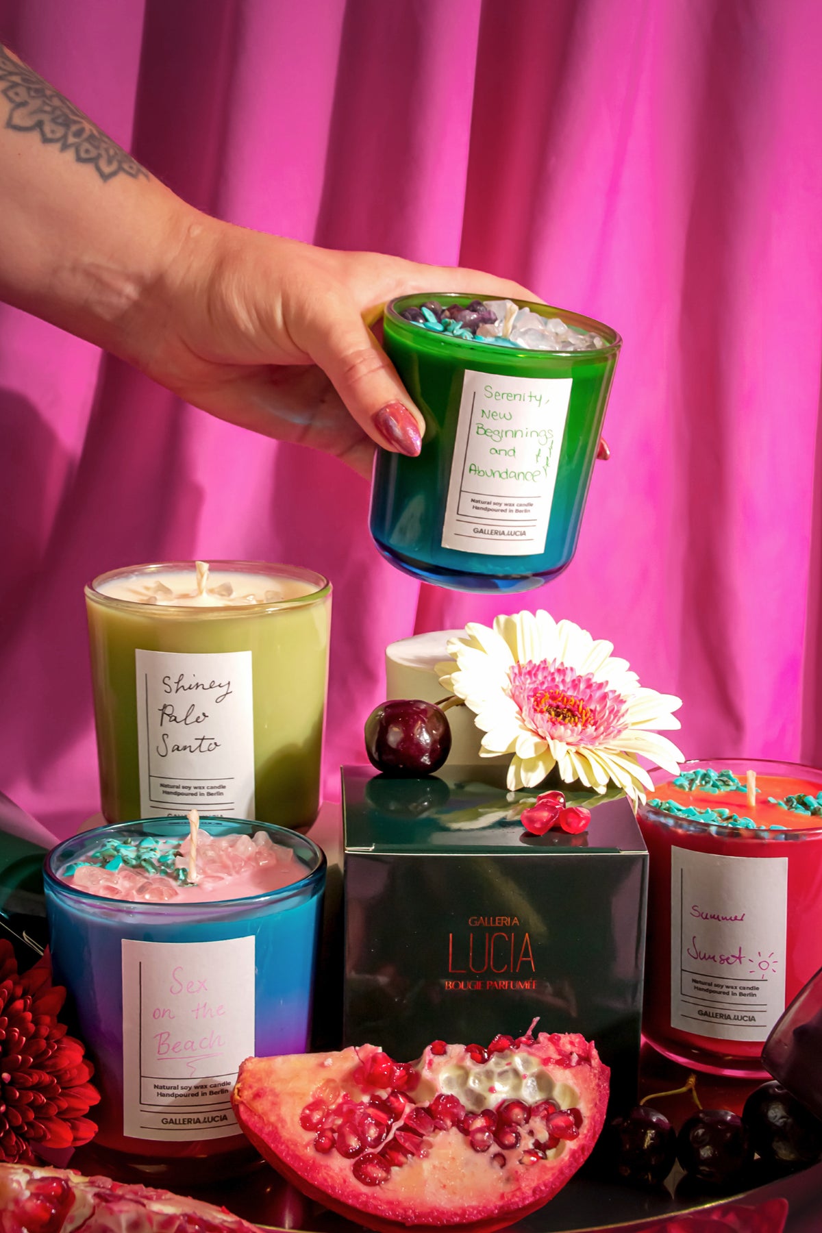 Results of a scented candle workshop, colourful candles with crystals