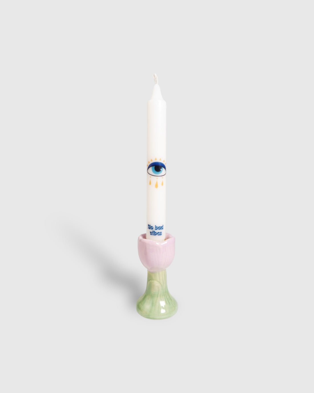 White vegan stearin taper candle with evil eye motifs 