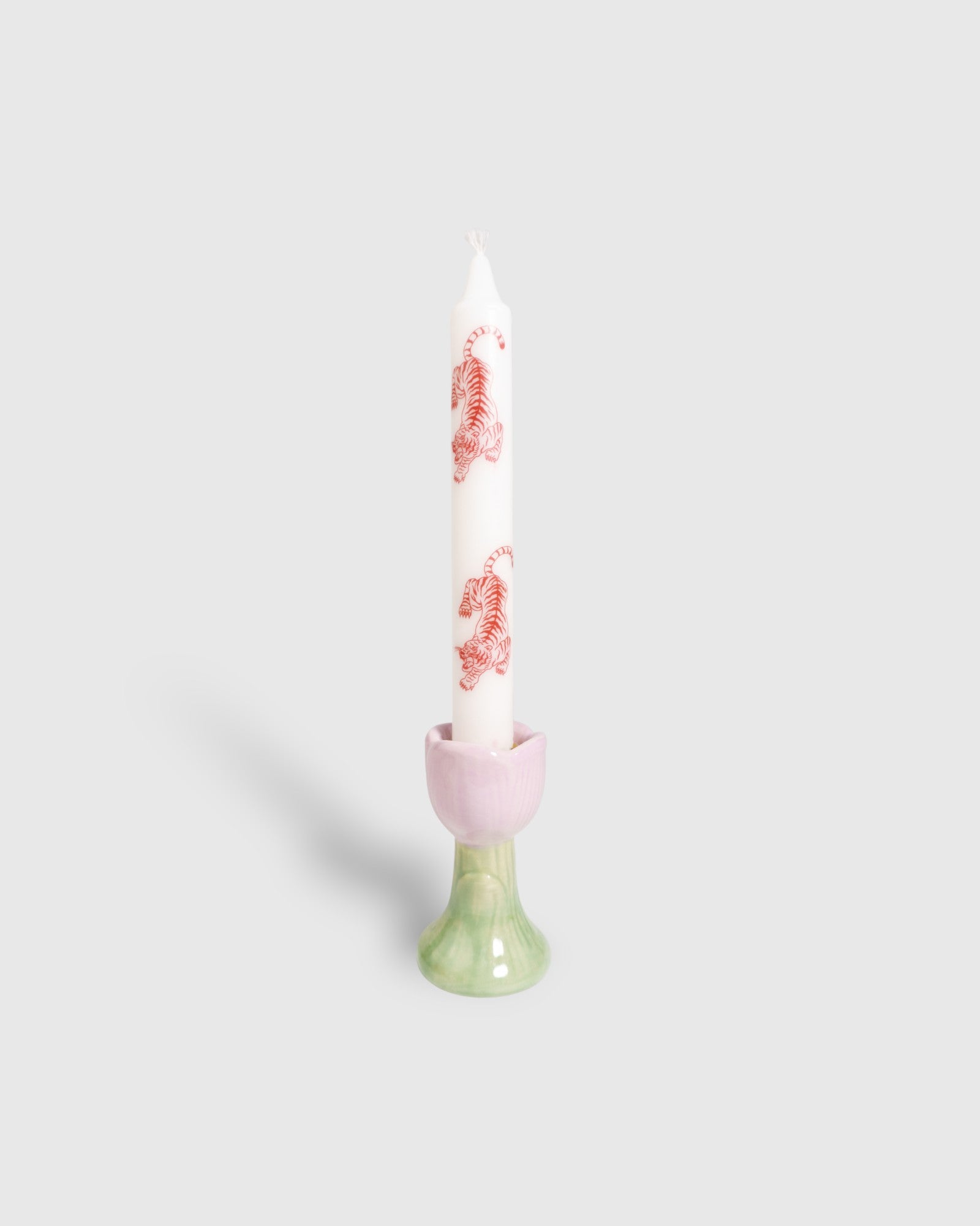 White taper candle from vegan stearin wax with red tigers