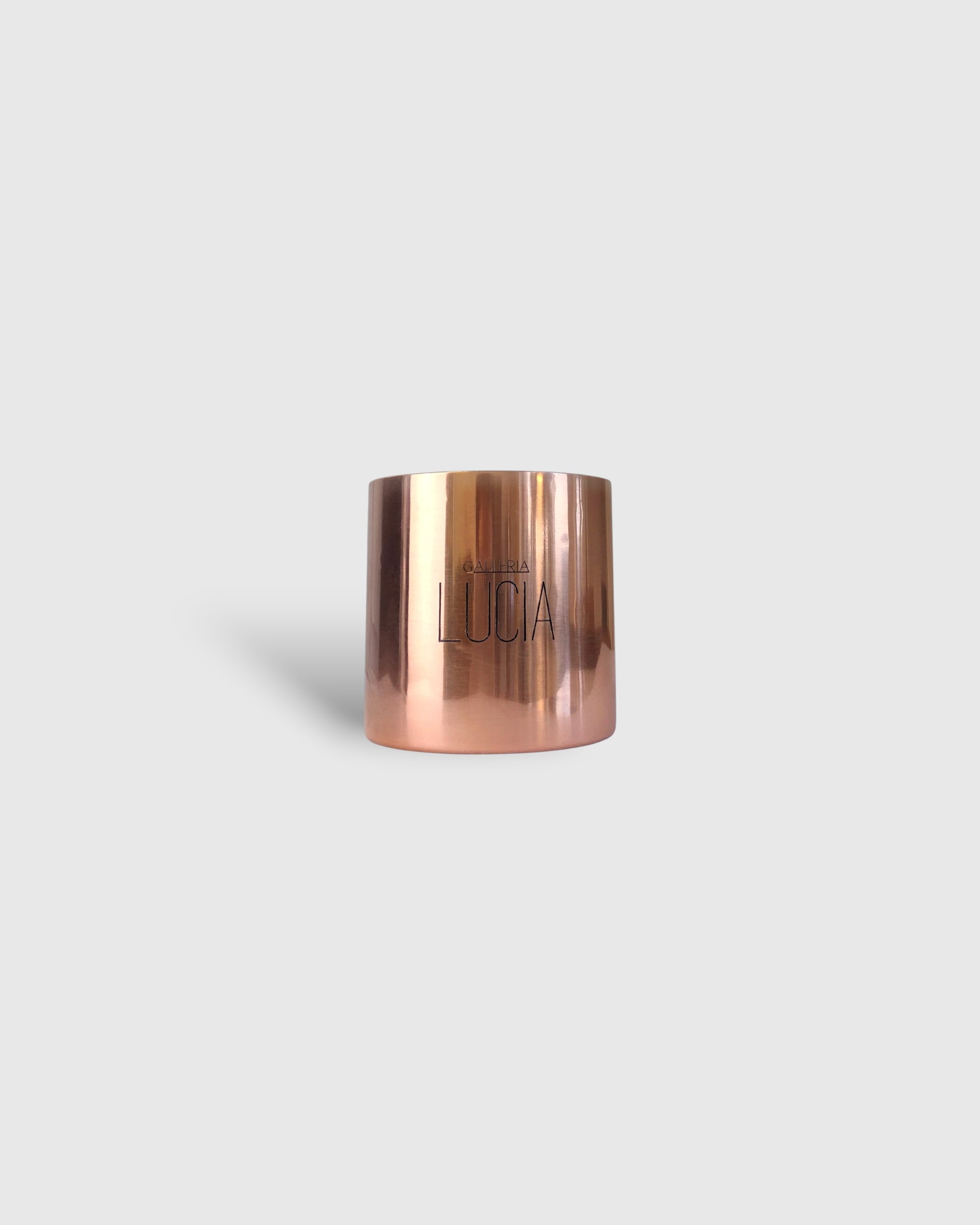 Copper or rose gold metal candle